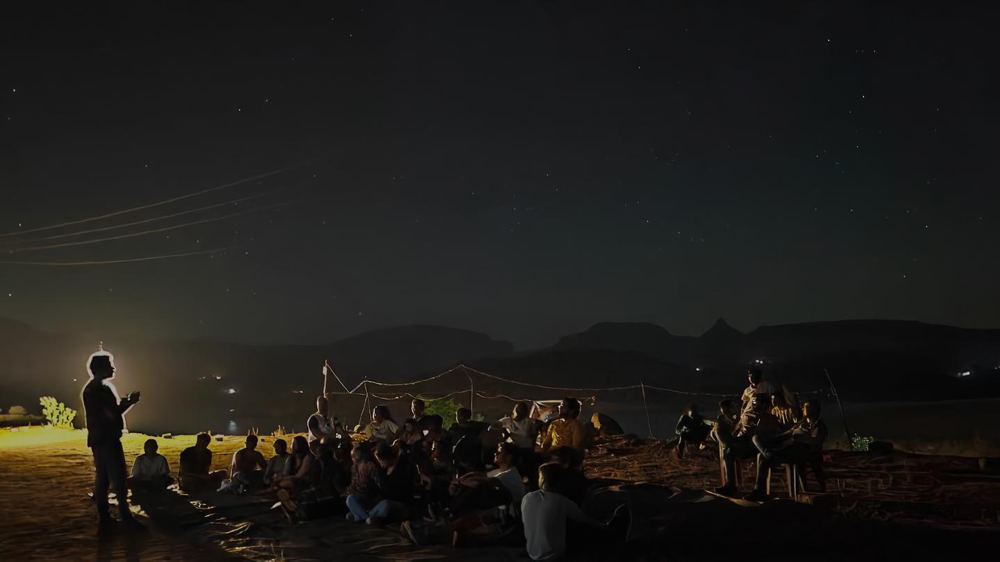 The Infinite.AU team stargazing under the night sky